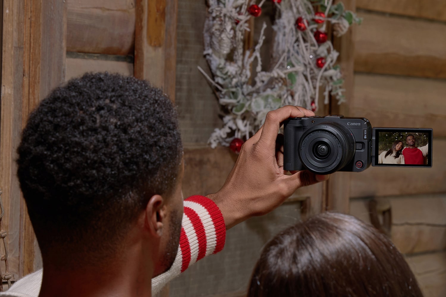 People Using a Camera to take a Picture