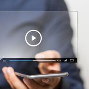 Person Watching a Video on a Smart Phone